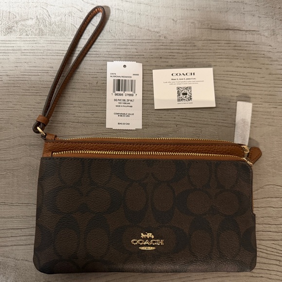 Coach Handbags - Coach Signature Brown and Tan Wristlet